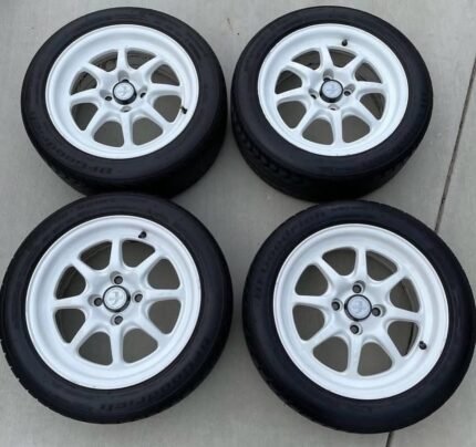 Enkei J-Speeds with hard to find center caps 15x7 +38 offset 4x 100