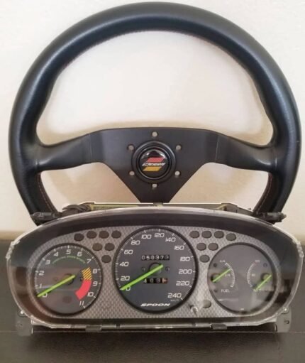 EK9 Type-r Spoon Sport cluster and a Spoon Gen1 steering wheel with horn.