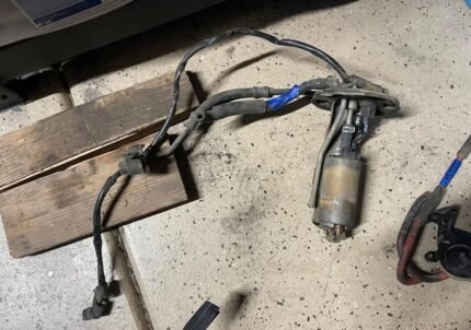 Fuel pump hangar from an 89 Honda Civic wagon.