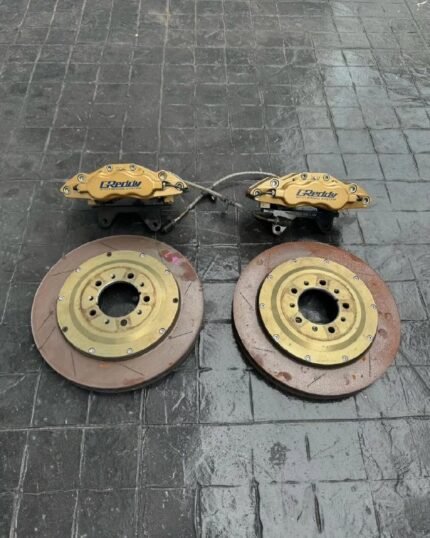 Original Greddy brake 6 Pot with 355 Rotor.