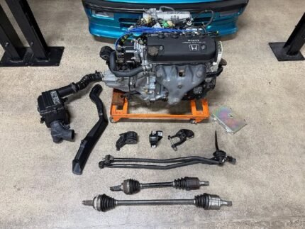 Minty D16A6 Si complete swap with a built trans Good compression numbers.